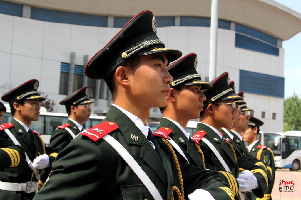 印象米兰·体育_米兰(中国) • 米兰·体育_米兰(中国)人的一天——国旗下的执着守护者（组图）